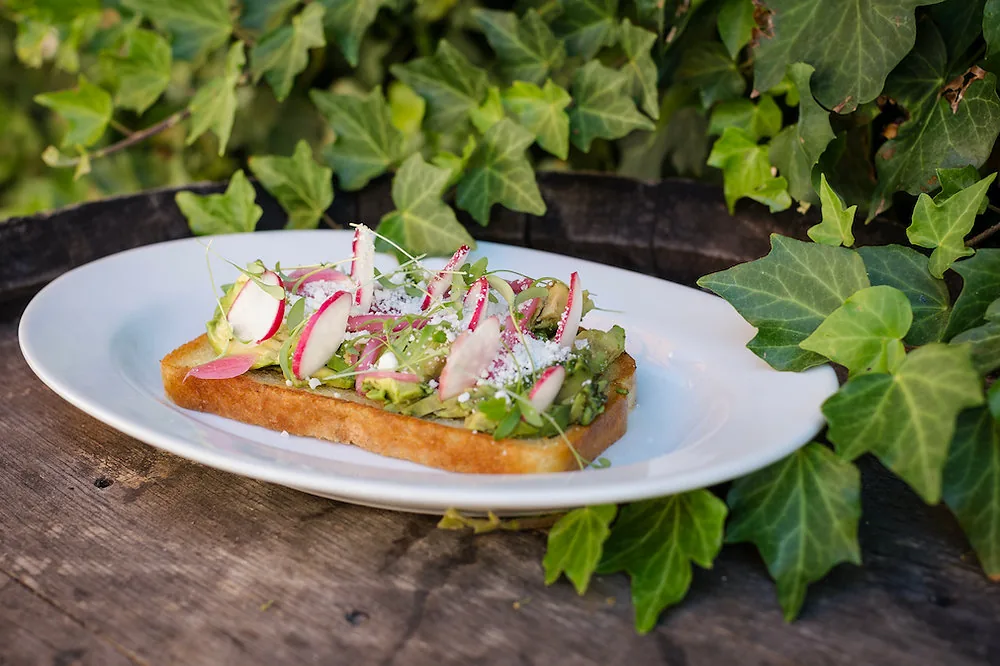 Avocado toast with local radish and cotija cheese