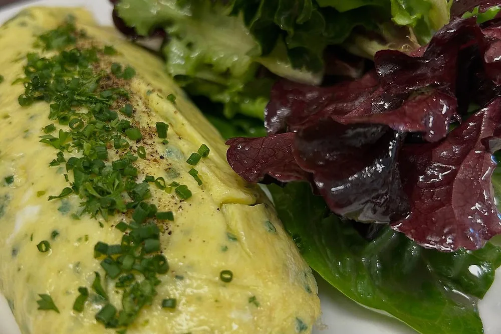 Classic French omelette with fresh herbs